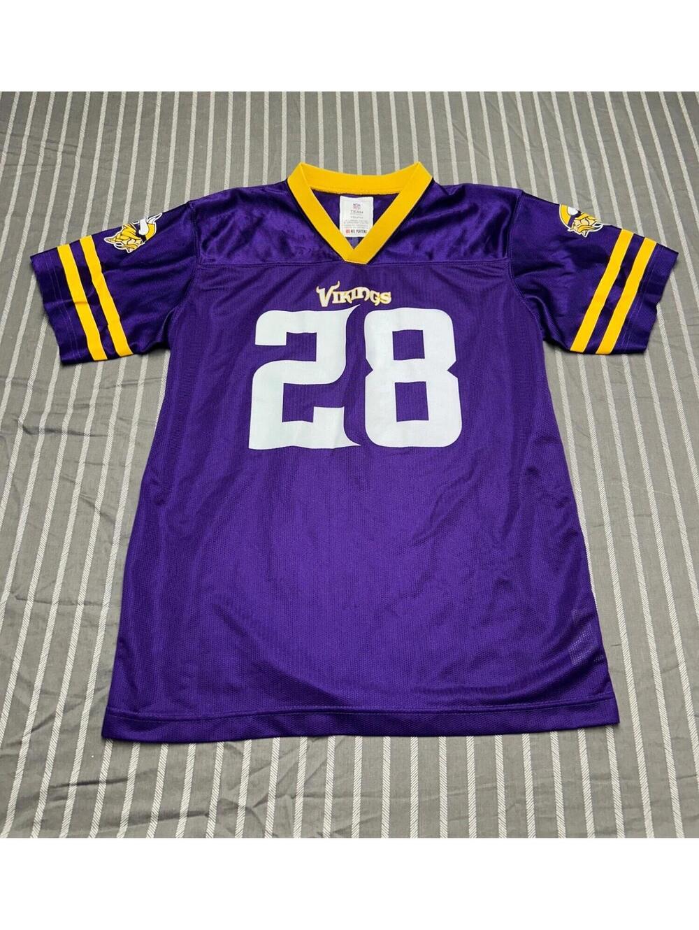 NFL Team Apparel Adrian Peterson #28 jersey features vibrant Minnesota Vikings